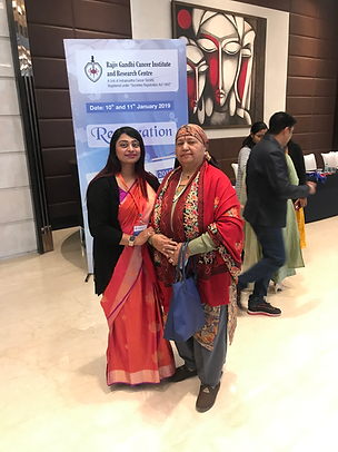 With a patient at the nursing conference at RGIRC